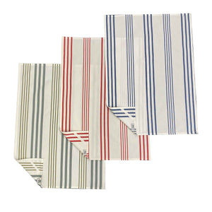 set of three striped kitchen towels or tea towels with vertical stripes in blue and white, one has red and white stripes, and one has grey and white stripes.