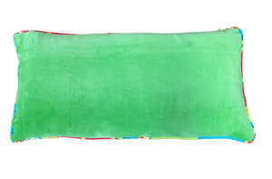 piped green velvet cushion