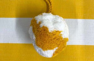 large-hanging-pom-pom-yellow-white_shotput.jpg