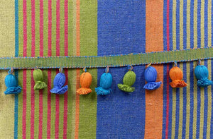 linen/cotton mix fabric with onion fringe sea green, ocean blue, apple green, terracotta.
