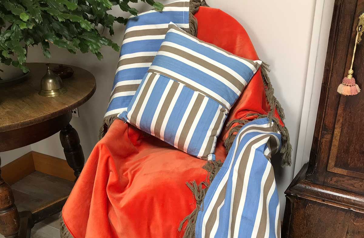 Reversible Velvet Throw with Taupe Fringe and Blue, Beige and White Stripes on reverse 