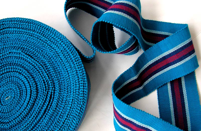 Turquoise, red and white stripe webbing