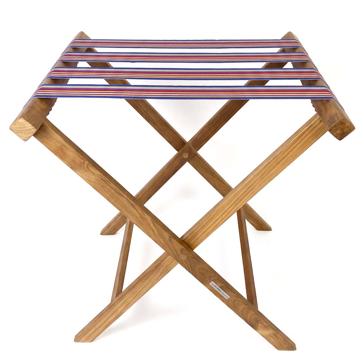 Folding wooden teak luggage rack with blue, lavender and burgundy multi stripe cotton webbing straps for hotel guest room
