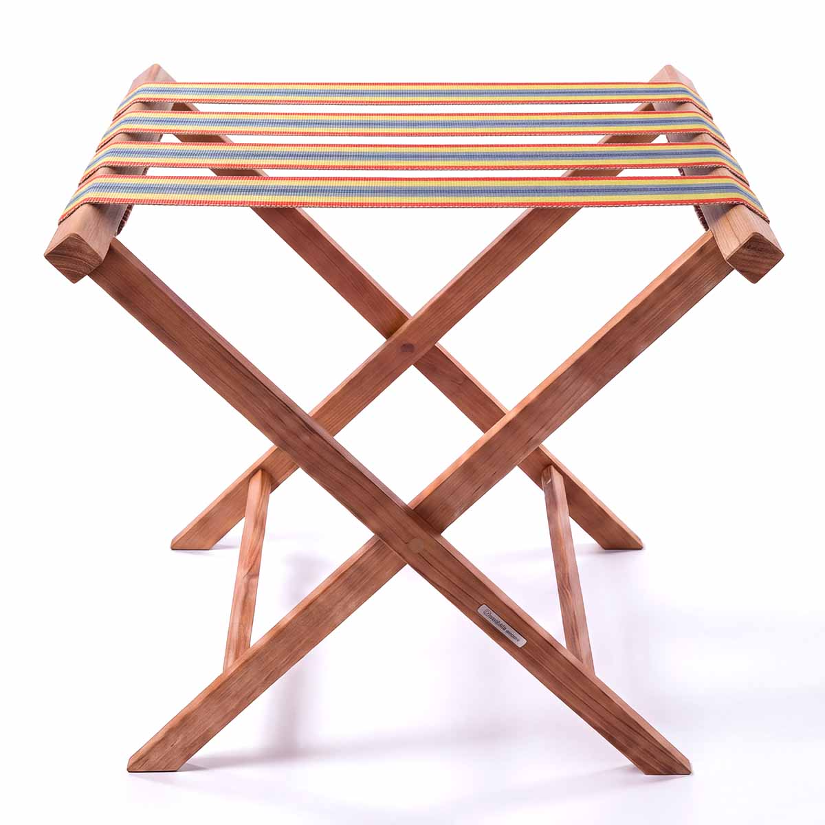 Folding wooden teak luggage rack with red, yellow and blue rainbow stripe cotton webbing straps for hotel guest room