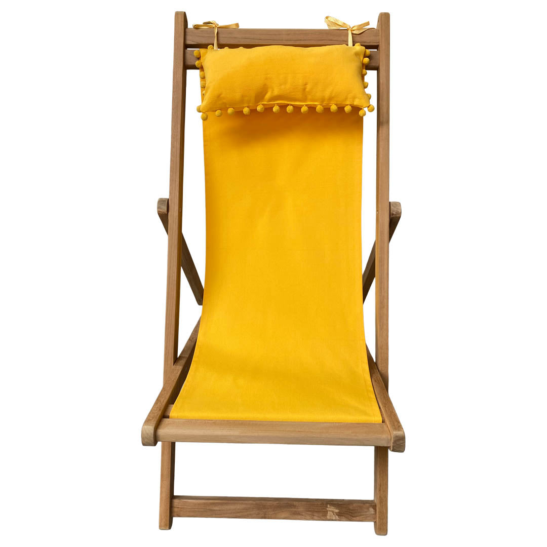 yellow head rest on yellow deckchair