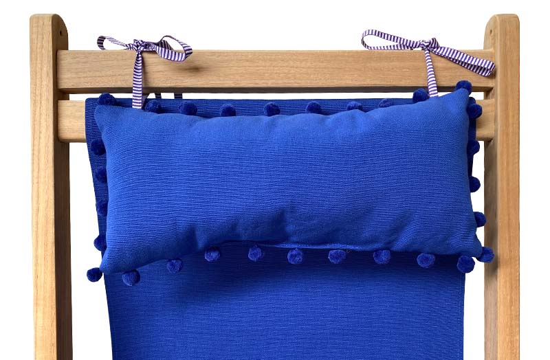 blue-headrest-blue-pompom-trim-on-deckchair.jpg
