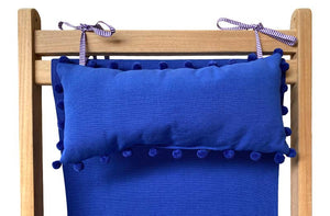 blue-headrest-blue-pompom-trim-on-deckchair.jpg