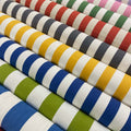 striped fabrics with colour combinations of white with blue, green, yellow, grey, red, and pink stripes.