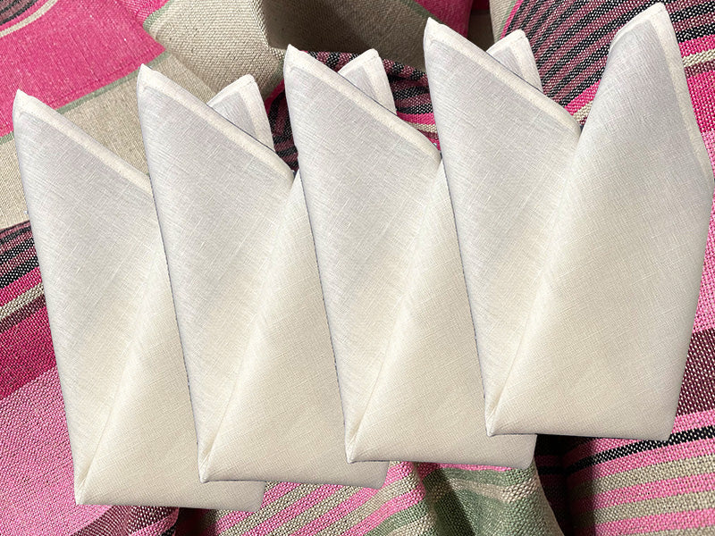cream-linen-napkins-on-pink-place-mats.jpg