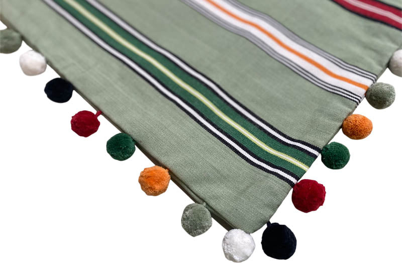 green-cushion-covers-with-pompom-trim-clock-golf-stripe-40-corner.jpg