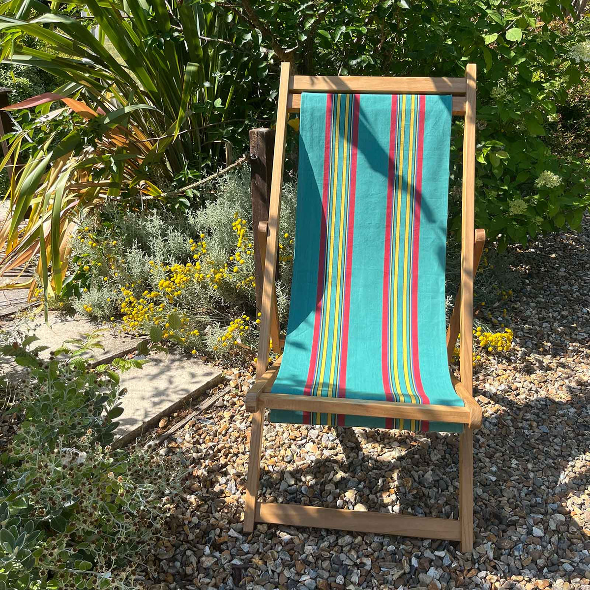 traditional deckchair with green red yellow stripe sling