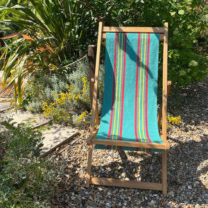 traditional deckchair with green red yellow stripe sling