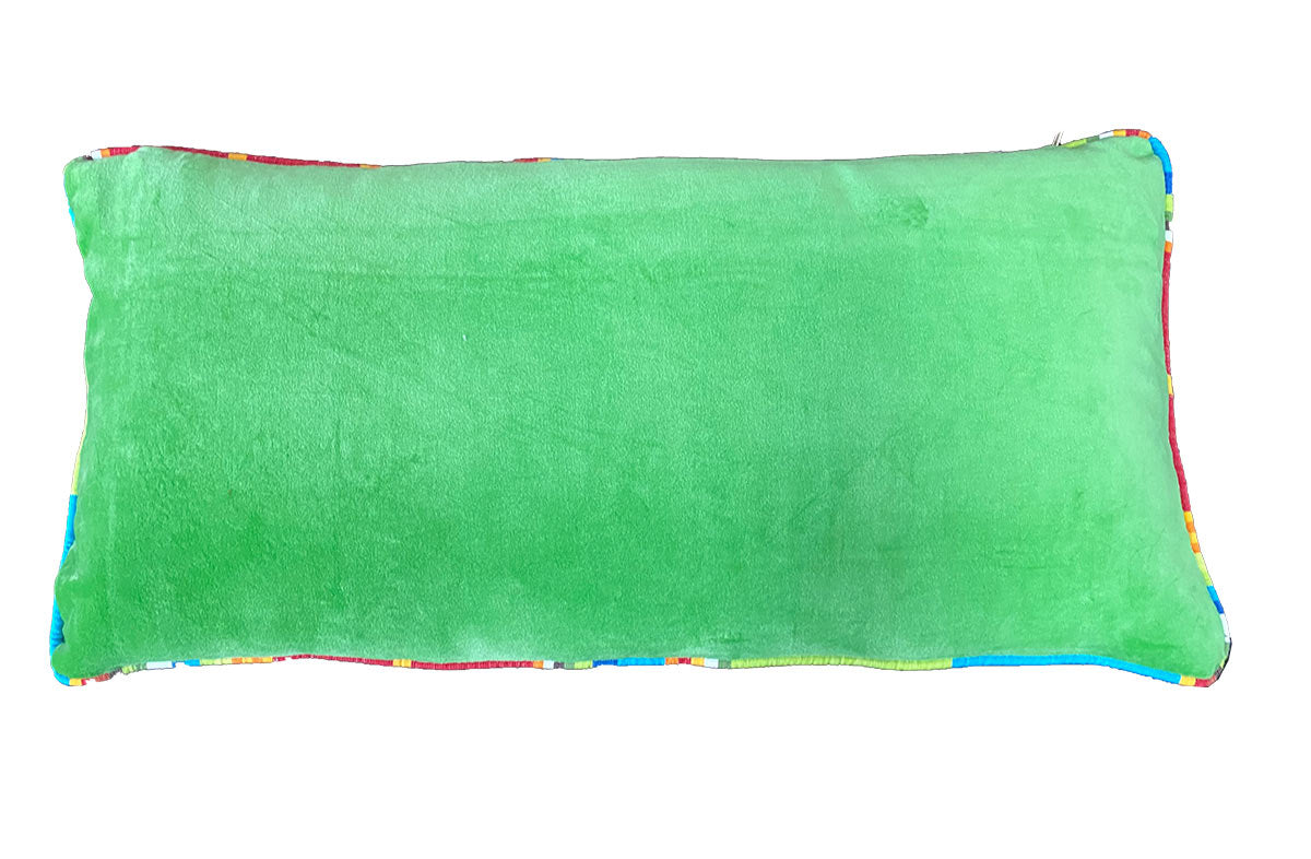 piped green velvet cushion