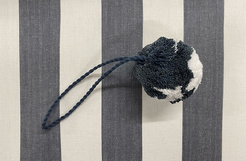 grey-white-hanging-pom-pom.jpg
