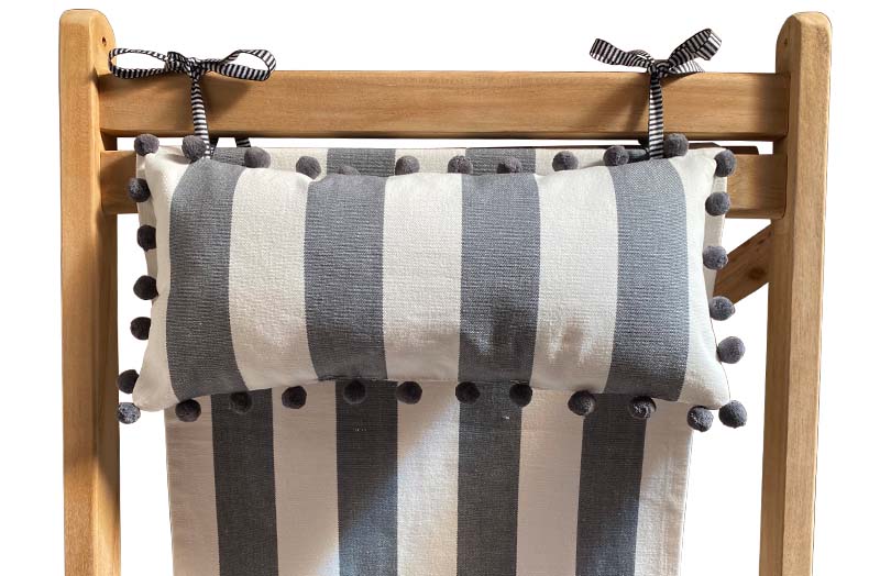 grey-white-stripe-headrest-charcoal-grey-pompoms-on-deckchair.jpg
