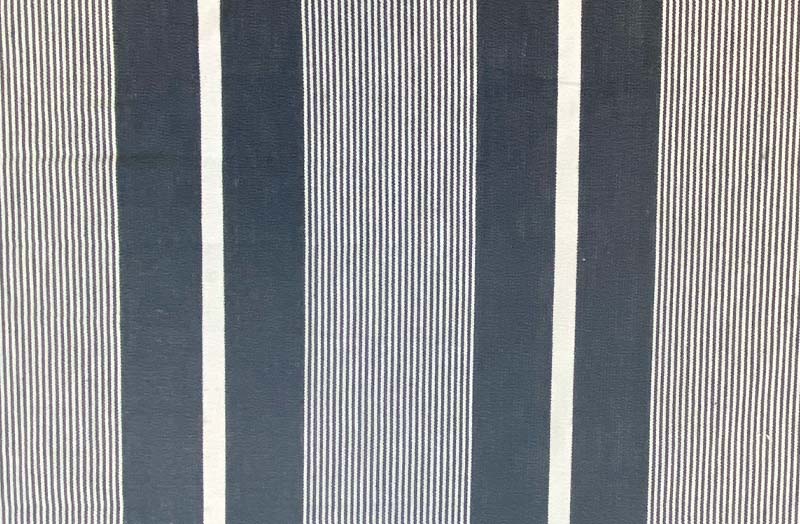 grey-white-striped-fabric-closeup-curling.jpg