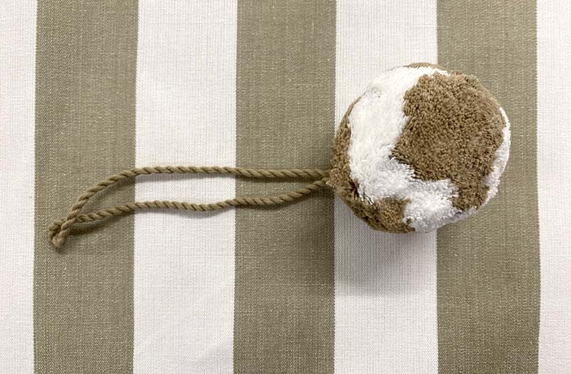 hanging-pom-pom-beige-white.jpg
