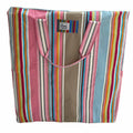huge fabric storage bag with vertical multicolour stripes in pink, pale blue,  taupe stripes and dual carry straps