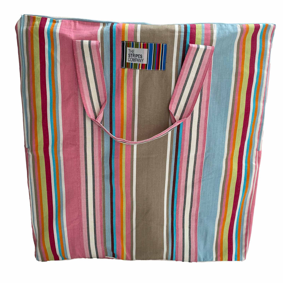 huge fabric storage bag with vertical multicolour stripes in pink, pale blue,  taupe stripes and dual carry straps