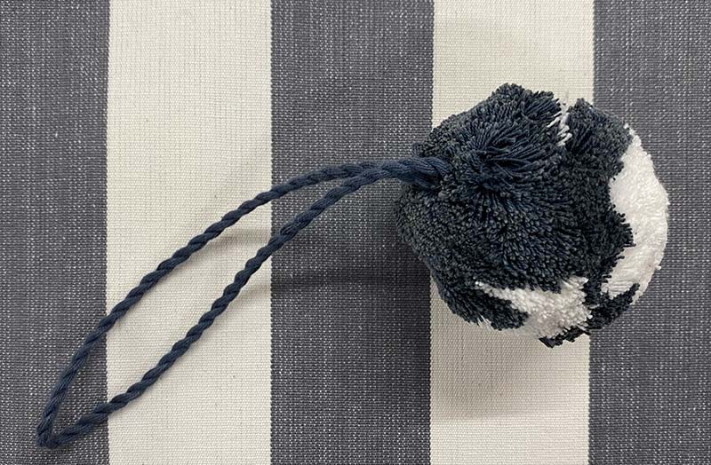 large-hanging-pom-pom-grey-white_hurdling.jpg
