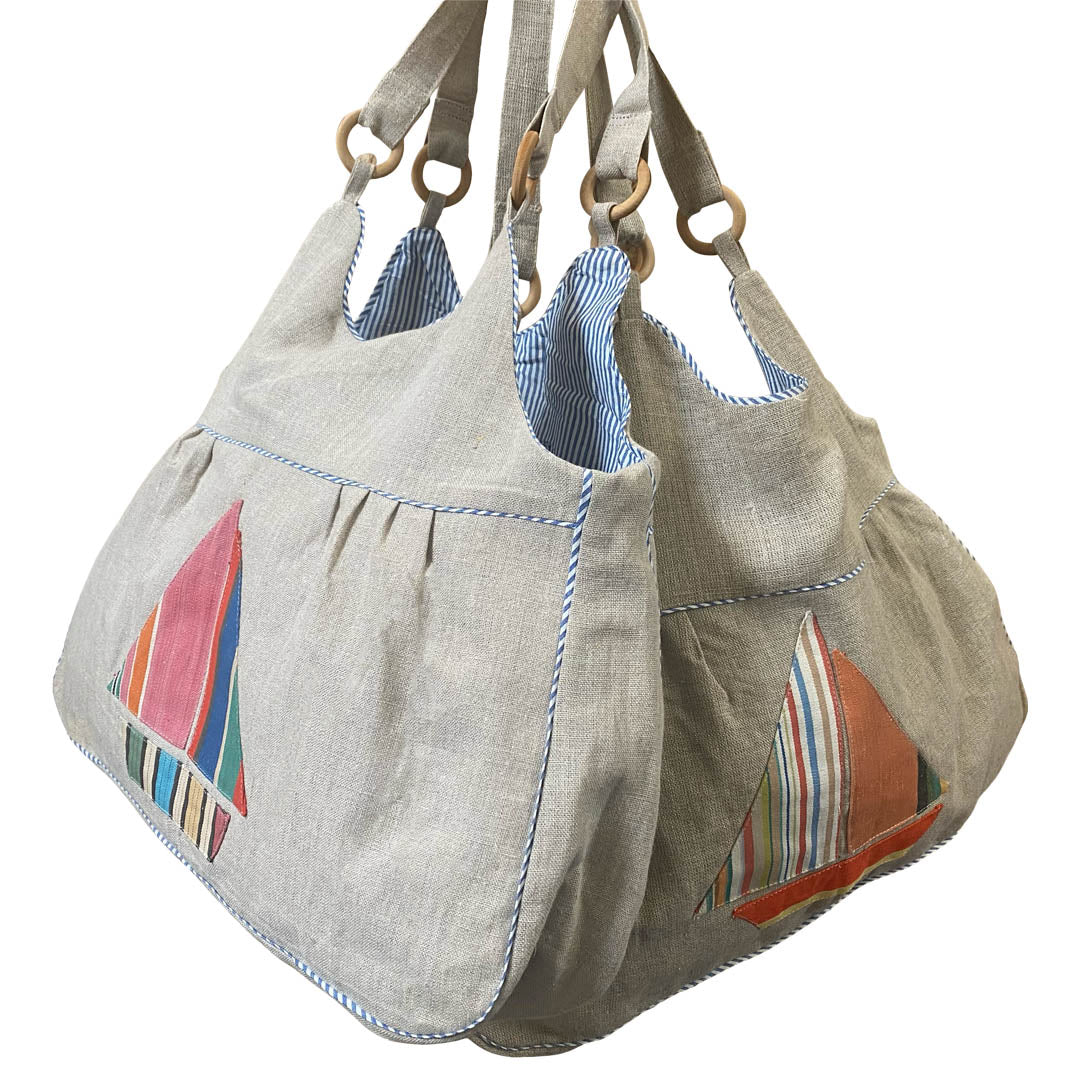 natural linen bags with stripe sail boat motif and blue white stripe lining