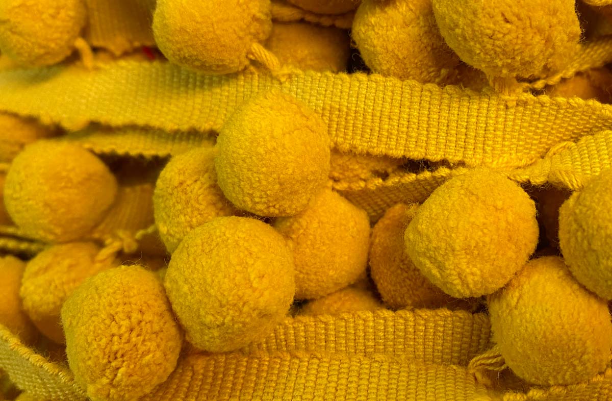 mustard-yellow-pompom-bobble-fringe.jpg