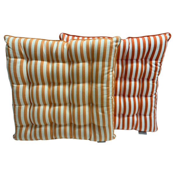 Two striped  seat cushions with orange and white pattern