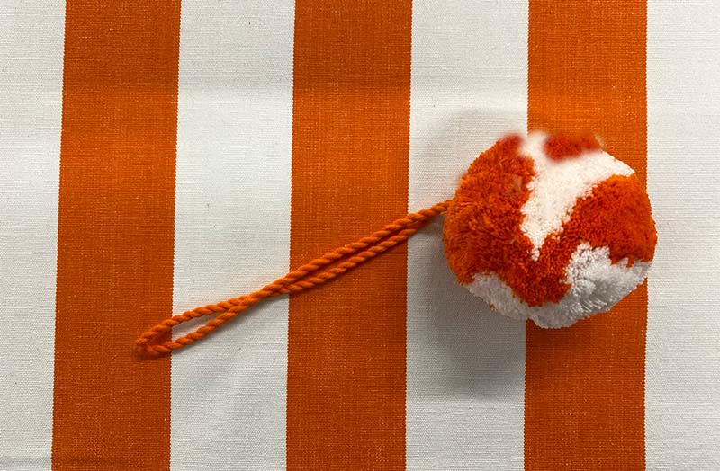 orange-white-hanging-pom-pom.jpg