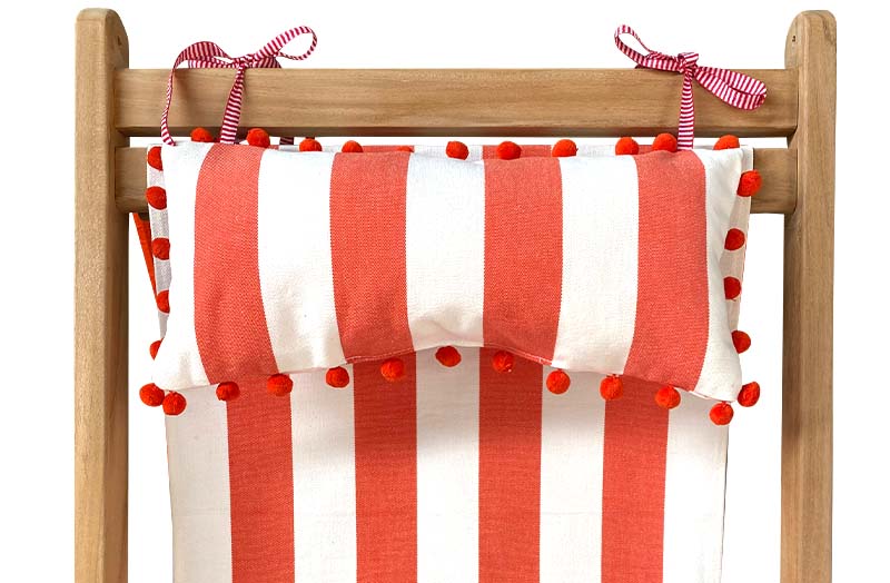 orange-white-stripe-headrest-orange-pompoms-on-deckchair.jpg