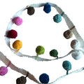parachuting-pompoms-on-tape.jpg