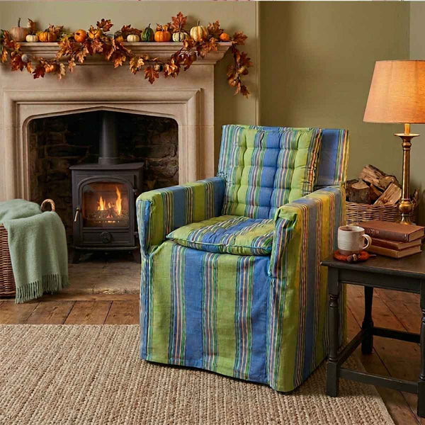 Soft blue and lime green striped cotton chair cover with matching striped seat pads to transform a wooden directors chair into comfortable indoor seating