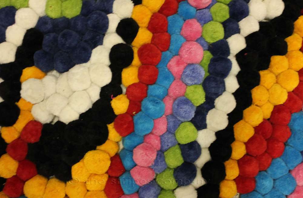 pompom-fringe-lg-multi_gliding.jpg