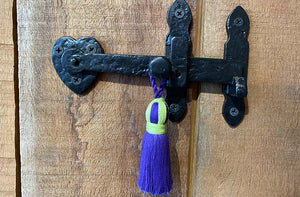 purple-small-decorative-tassel-on-door-latch.jpg