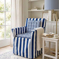 Deep blue and white striped cotton chair cover with smaller striped seat pad to transform a wooden directors chairs into comfortable indoor seating