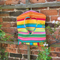 peg bag - colourful striped fabric bag with a heart-shaped opening for holding washing line pegs