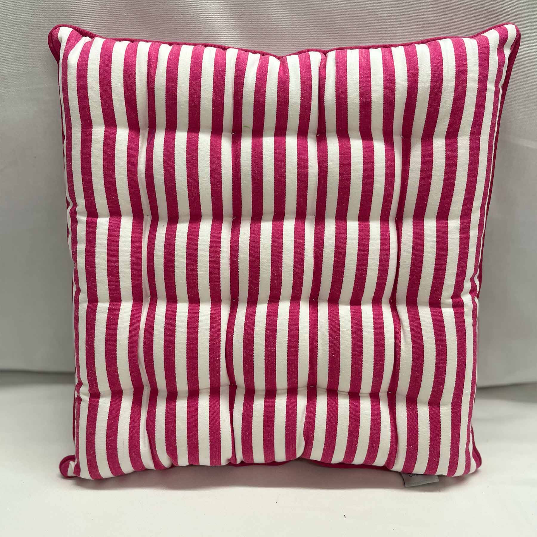 Striped seated with bright pink and white vertical stripes