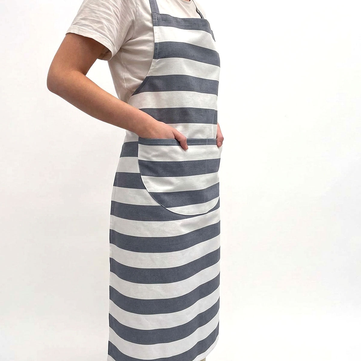 grey and white striped apron with large pockets