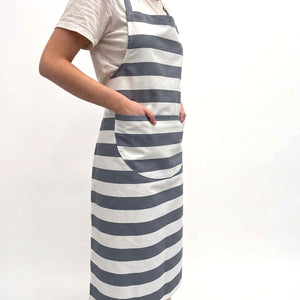 grey and white striped apron with large pockets