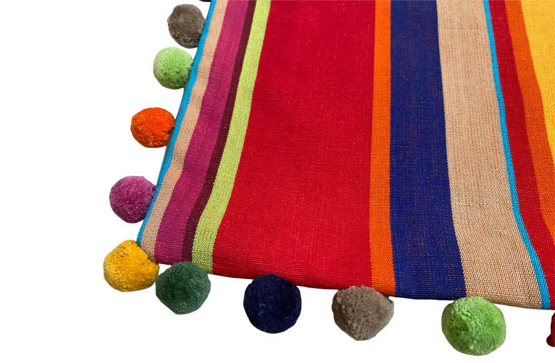 striped-cushion-covers-with-pompoms-origami-stripe-40-corner.jpg