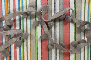 taupe-bobble-fringe-taupe-pompoms-on-slamball-stripe-fabric.jpg
