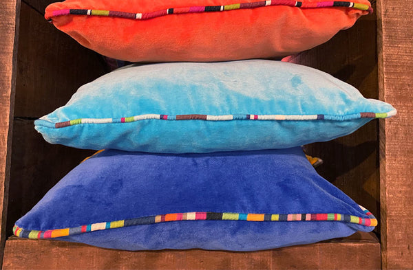 velvet-cushions-with-stripe-piping.jpg