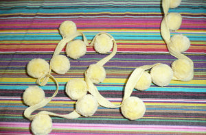 yellow-bobble-fringe-large-yellow-pompoms.jpg