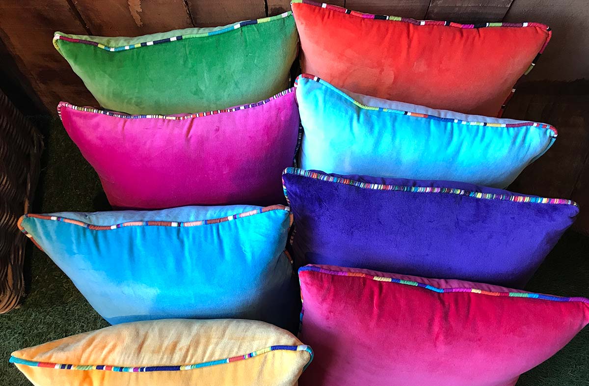 velvet cushions with striped piping