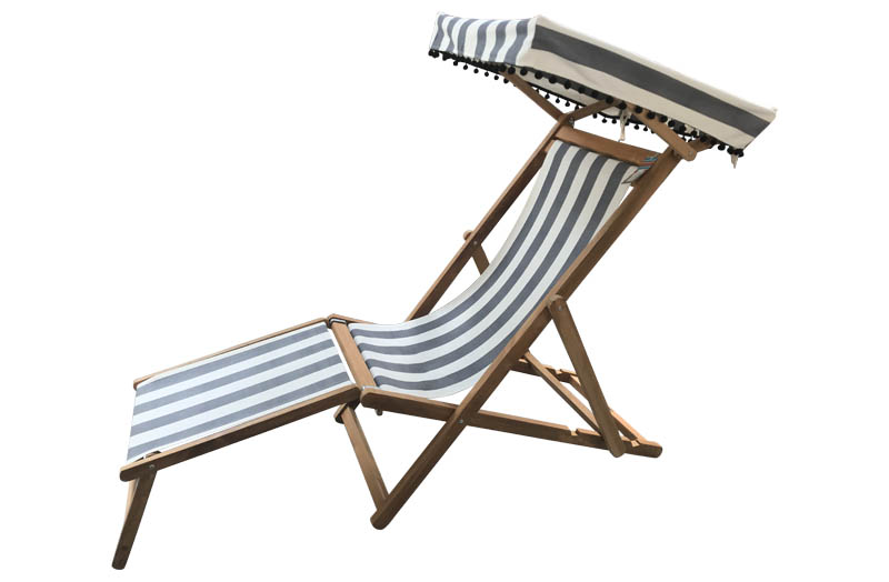 grey white striped deck chair with canopy foot stool