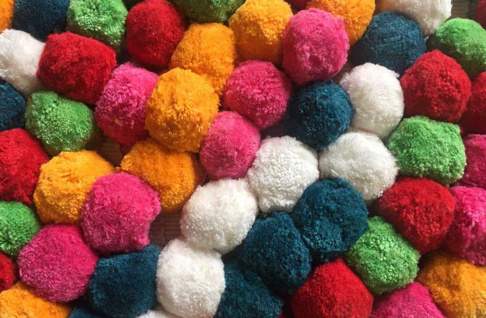 pink, green, yellow, deep turquoise, red and white pompom sample