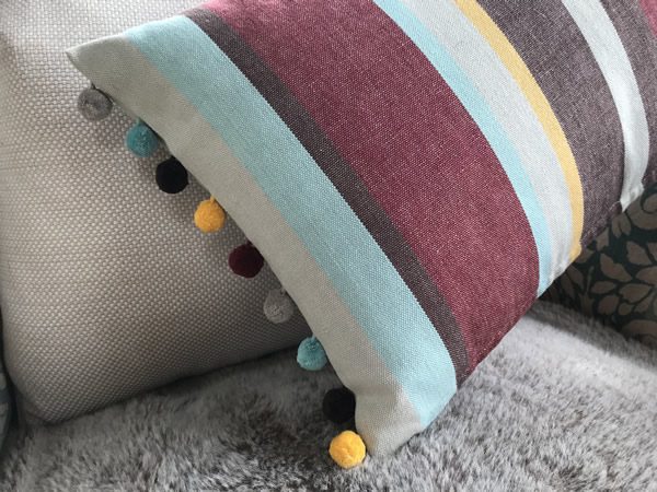 Earth Tones Striped Oblong Cushions with Bobble Fringe 