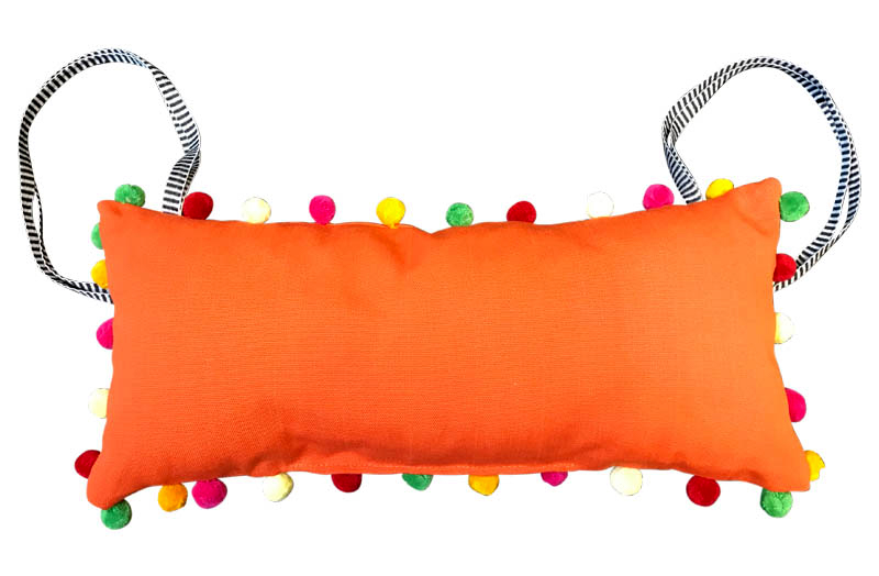 orange headrest multi pompoms black ties
