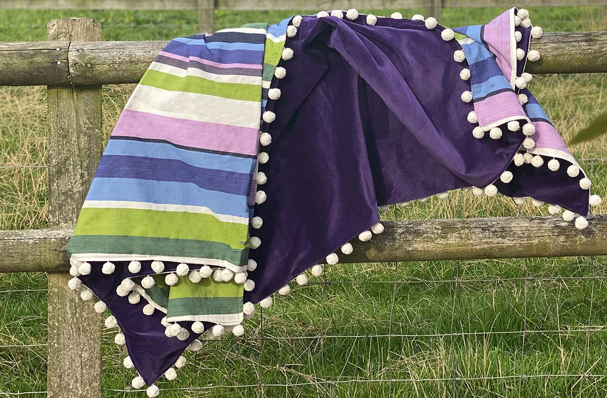 Reversible Purple Striped Velvet Throws Trimmed with White Pom Poms 