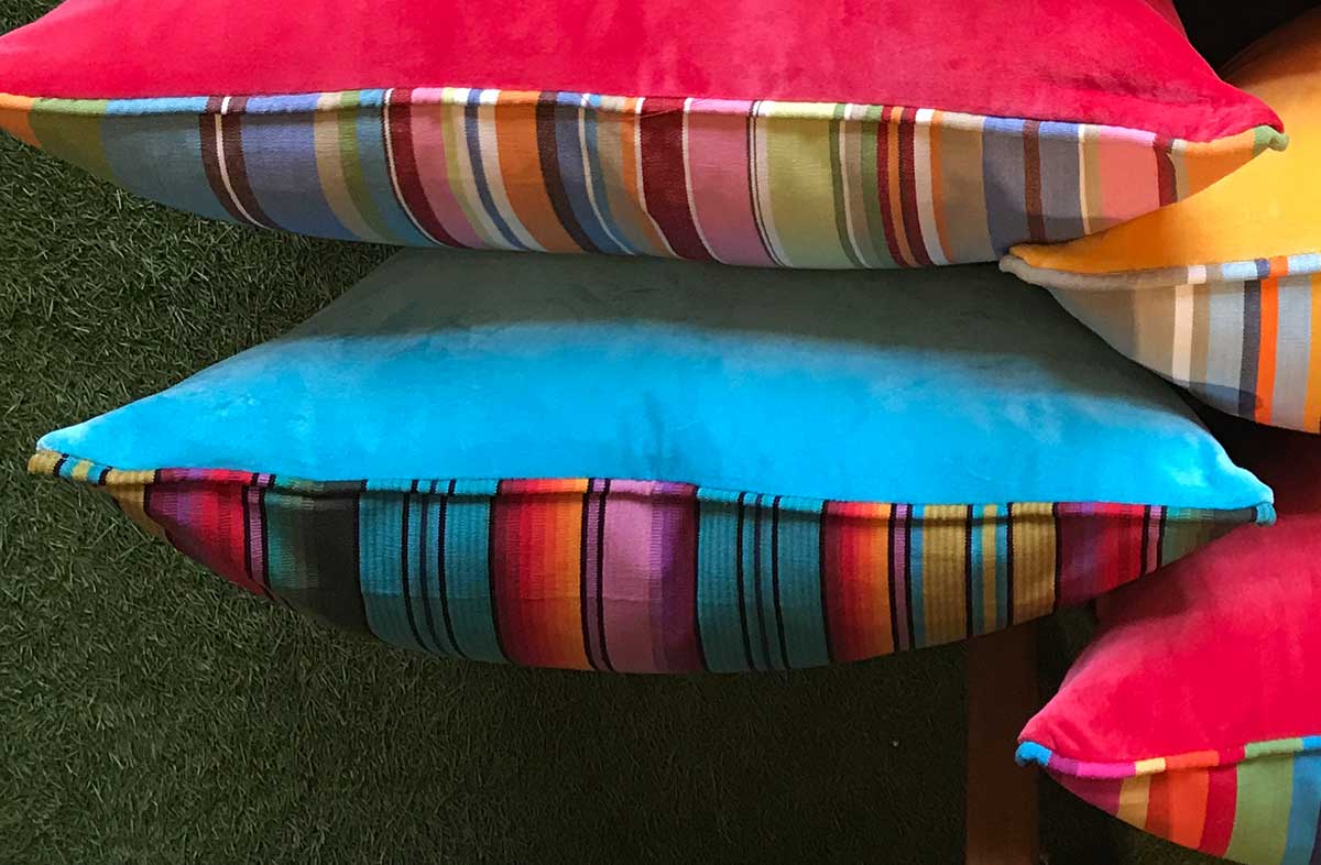 turquoise velvet and striped fabric cushion 